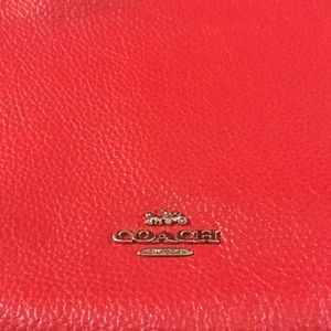 Red COACH crossbody handbag, wallet and coin purse